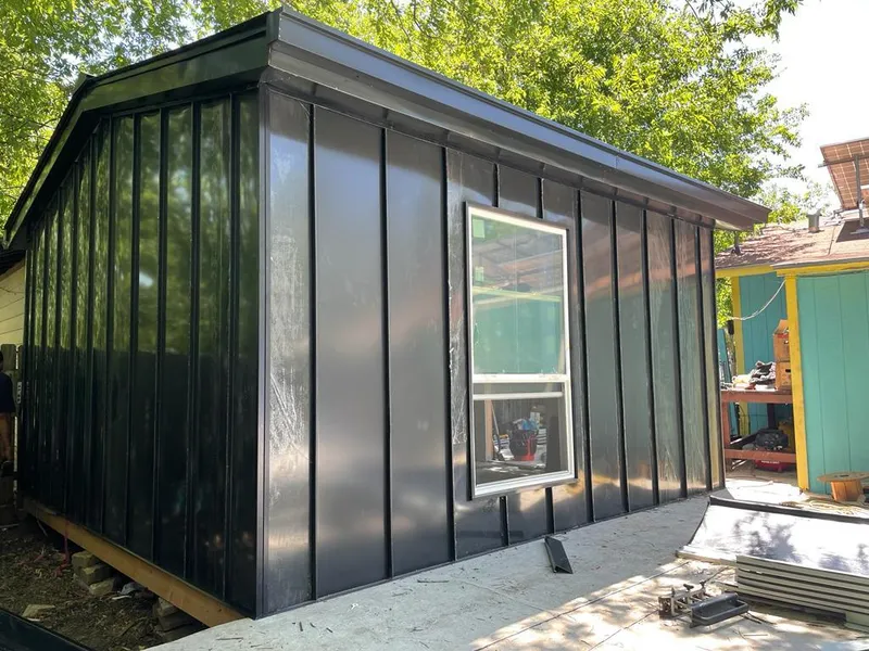 Black standing seam metal wall panels for Roof Inspection in Hamlin