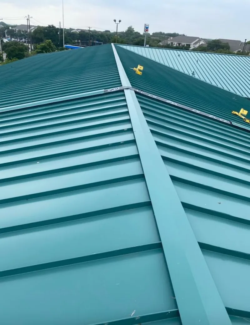 Green commercial metal roof ridge and valley for Metal Roof Repair in Hamlin